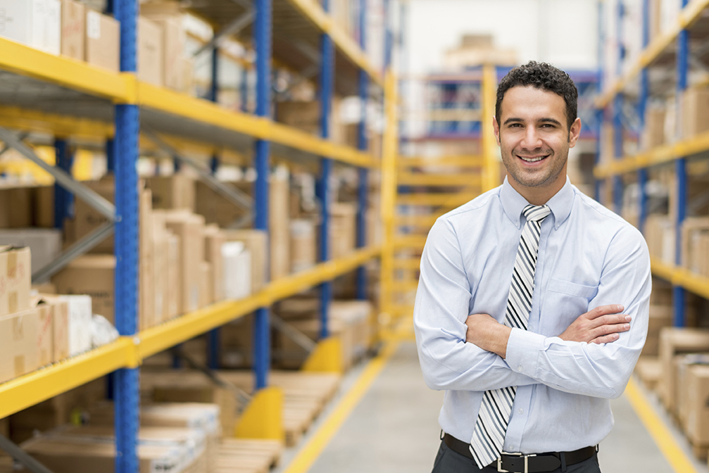 Business man in a warehouse